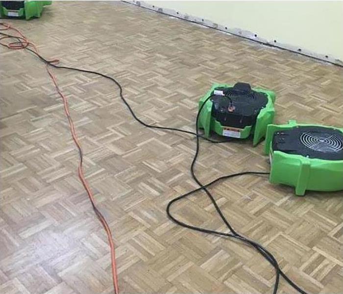 green fans on tile floor